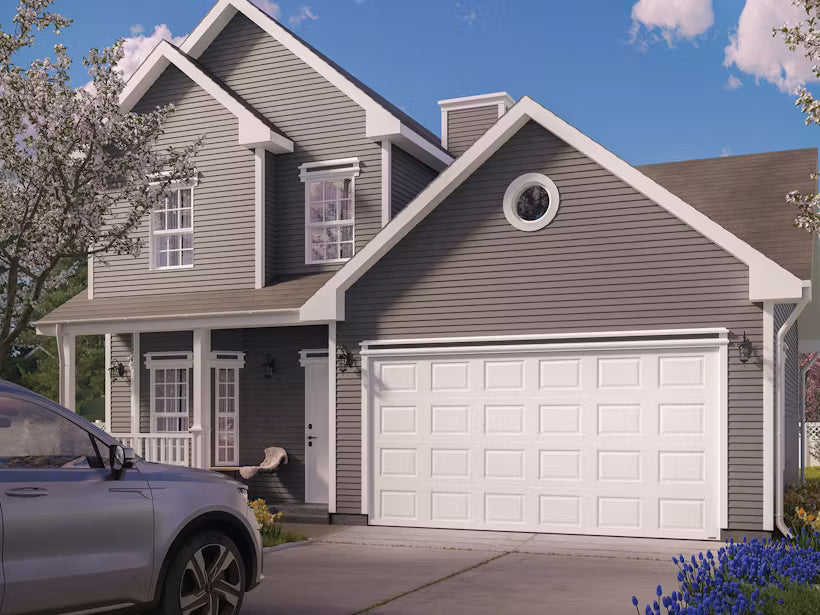 White raised-panel traditional garage door